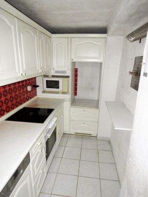 Küche mit Einbauküche 