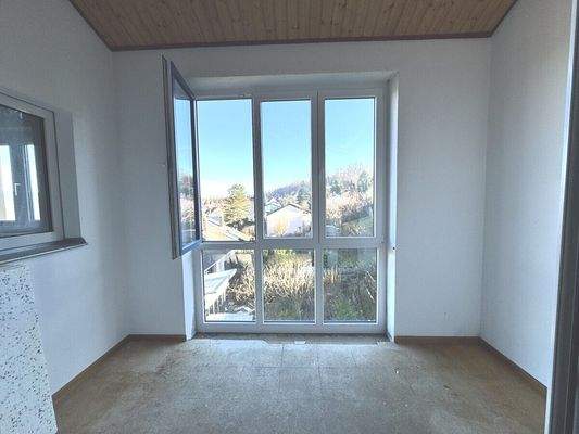 Wintergarten/geschlossener Balkon mit Aussicht