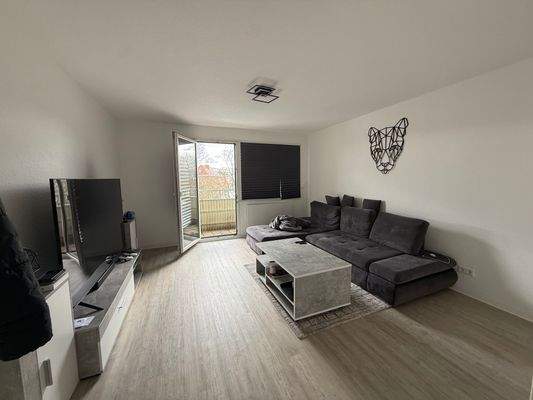 Wohnzimmer mit Balkon