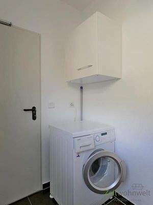 Waschmaschine im Hauswirtschaftsraum