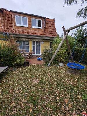 Hausrückseite und Gartenbereich