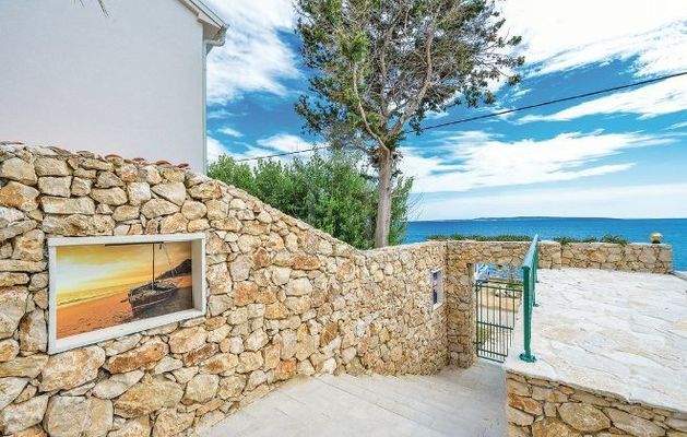 Nur ein paar Stufen trennen Sie vom Strand und Meer