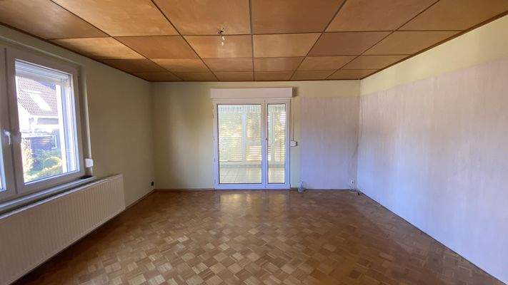 Wohnzimmer mit Parkett