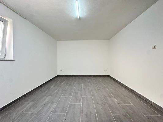 Wohnung UG rechts I Schlafzimmer