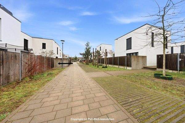 Blick in das Quartier mit Zugang zum Garten