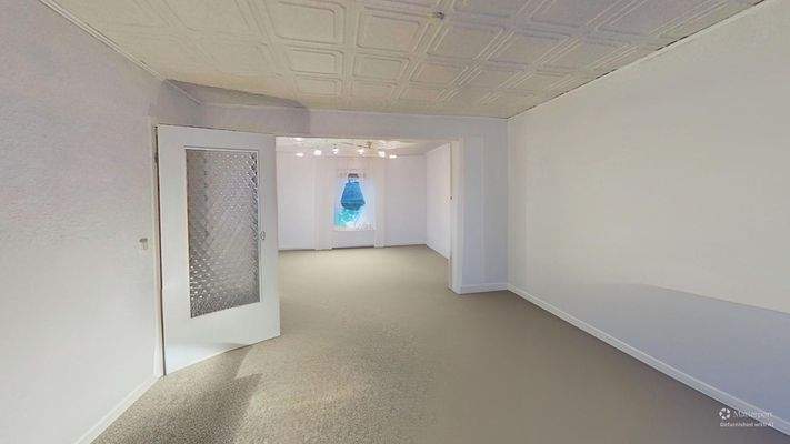 Karl-Marx-Str-22-Living-Room-Defurnished 1.jpg