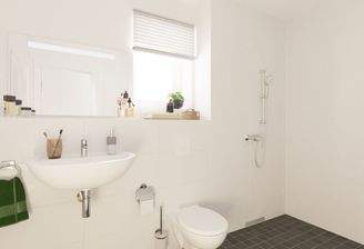 Badezimmer mit bodengleicher Dusche