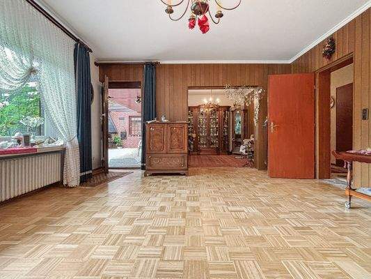 Wohnzimmer und Zugang Terrasse