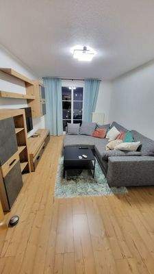 Wohnzimmer mit Boden in Dielenoptik