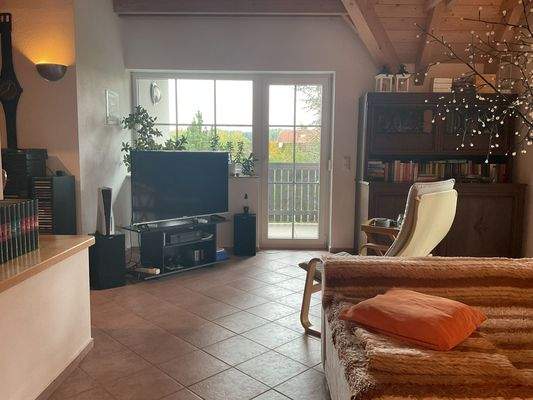 Wohnbereich OG mit überdachtem Balkon