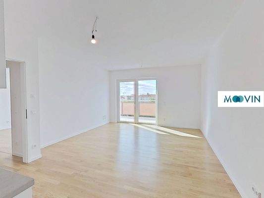 Ansicht II: Wohn- und Esszimmer mit offenem Küchenbereich