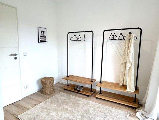 Ankleidezimmer mit Balkon