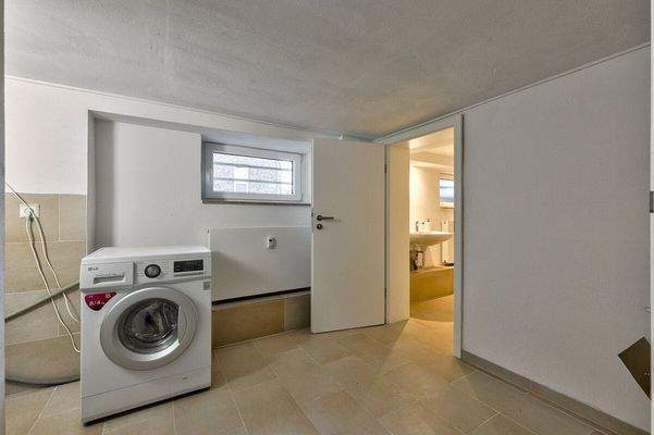 Gemeinschaftsraum im Kellergeschoss mit Waschmaschinenanschluss