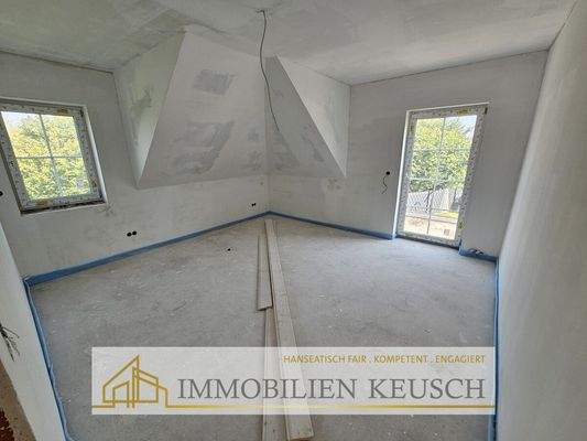 Schlafzimmer mit Zugang zur Terrasse