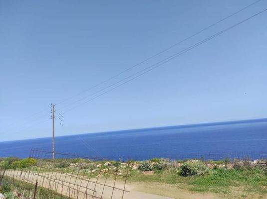 Kreta, Omprogialos: Grundstück mit unverbaubarem Meerblick zu verkaufen