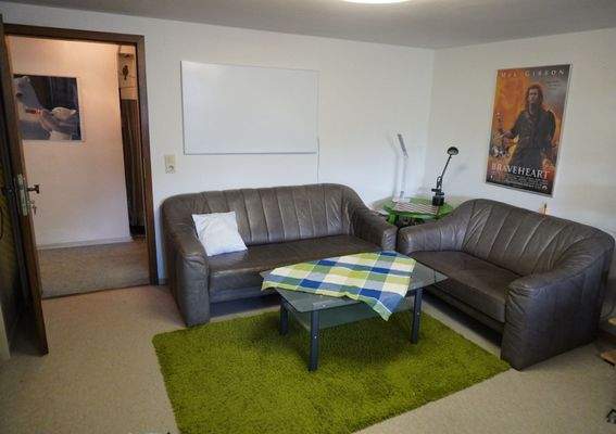 Wohnzimmer mit Holzofen UG