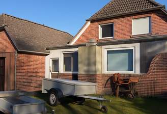 Garage und angebauter Wintergarten