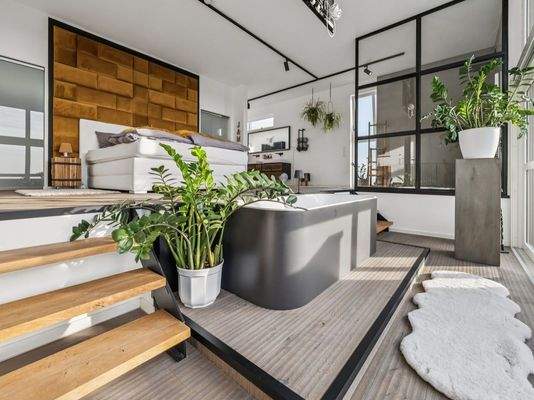 Schlafzimmer mit Masterbad