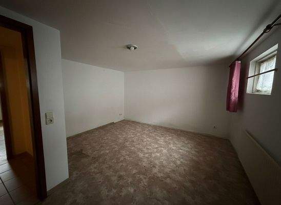 Hobby- oder Gästezimmer im Kellergeschoss