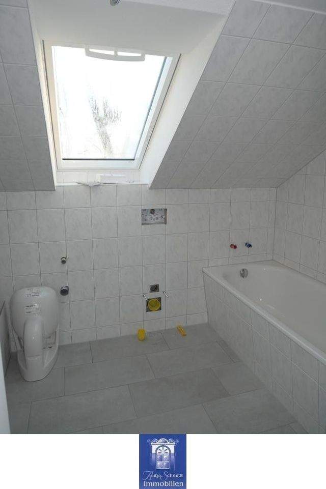 Individuelle Dachgeschosswohnung mit offener Küche! - Photo 1