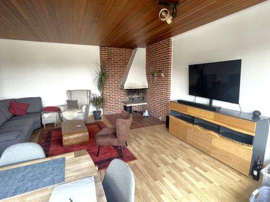 Wohn-Essraum mit Kamin