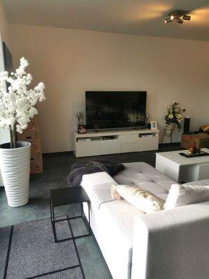 Wohnzimmer mit Balkon