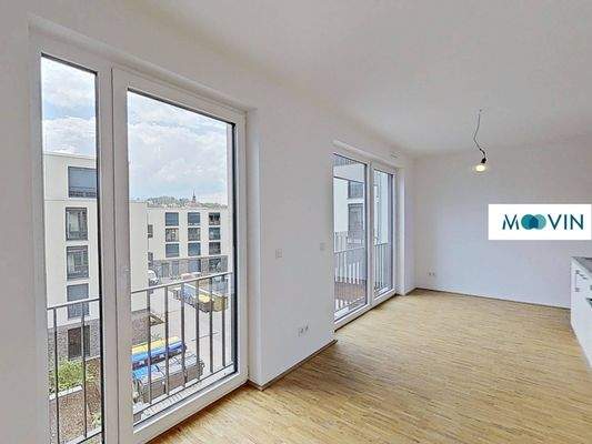 Ansicht III: Wohn- und Esszimmer mit offenem Küchenbereich