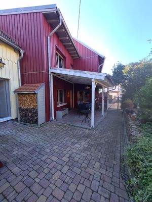 überdachte Terrasse am Haupthaus