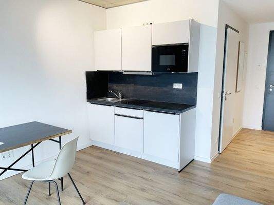 Zimmer Kochbereich mit EBK