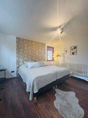 Wohnung im DG Schlafzimmer 