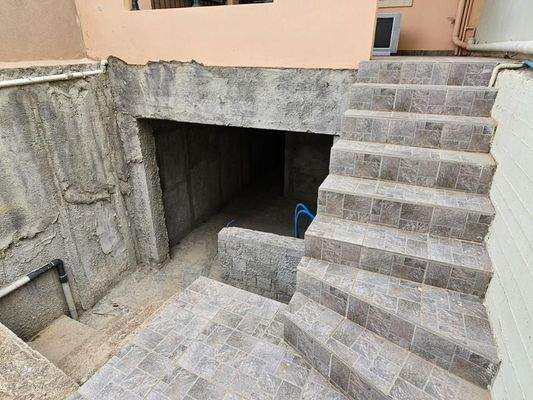 Kreta, Koutouloufari: Haus im Dorfzentrum mit großer Dachterrasse mit herrlichem Blick auf Hersonissos und das Meer zu verkaufen