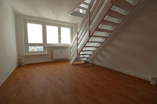 Wohnbereich mit Treppenaufgang