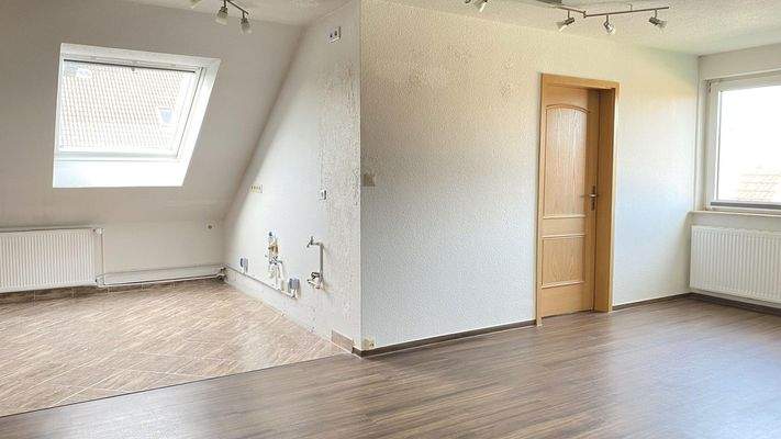 Wohnzimmer- Küche und Bad 