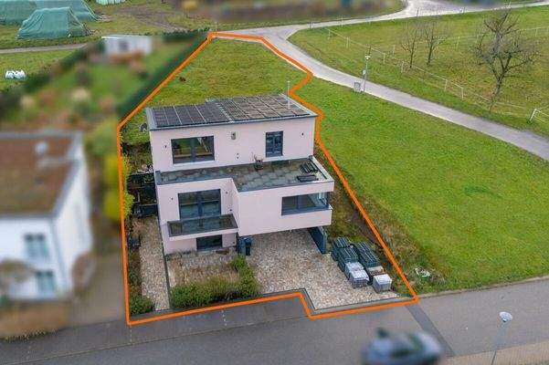 Luftansicht mit ungefährer Grundstücksmarkierung