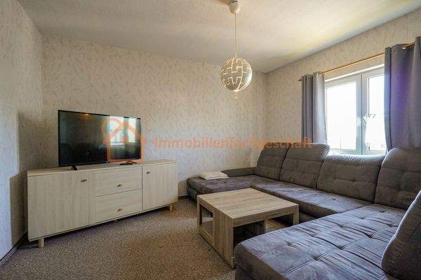 Wohnzimmer mit Ecksofa