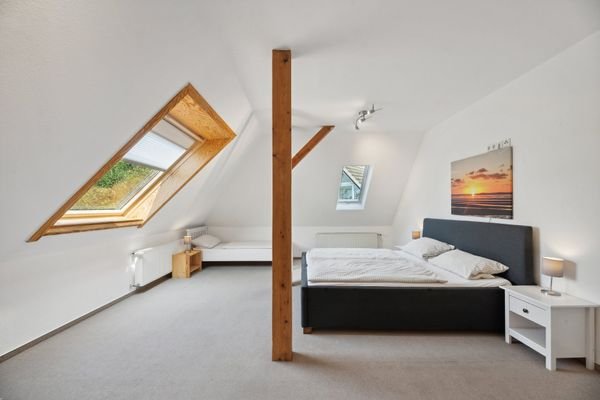 Schlafzimmer 2 im Obergeschoss Ansicht 1