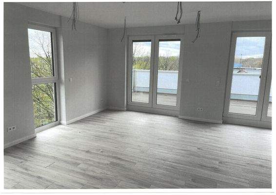 Wohnzimmer zur Dachterrasse