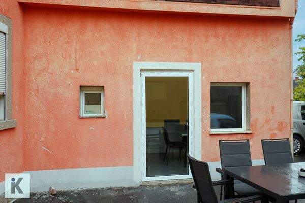 Ausseneingang Küche