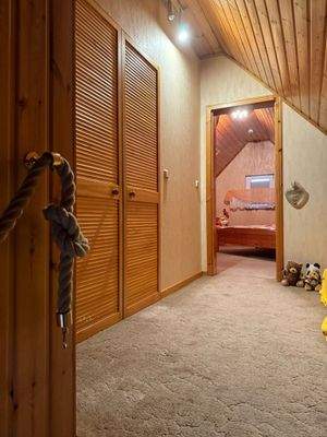 Begehbarer Kleiderschrank und Schlafzimmer