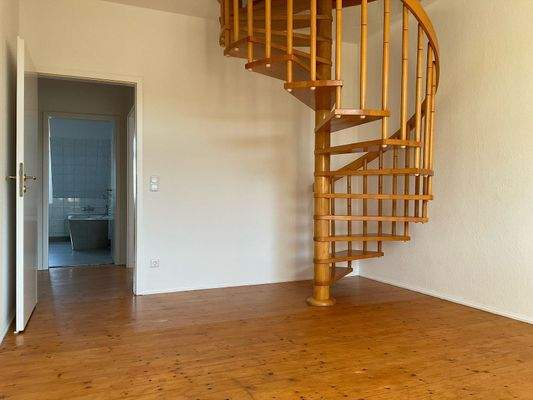 Wohnzimmer mit Zugang zur zweiten Ebene