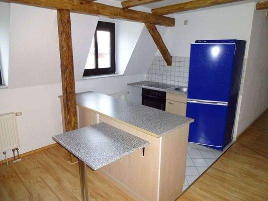 Kochbereich mit Einbauküche