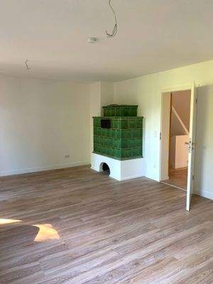 Wohnzimmer mit Kachelofen