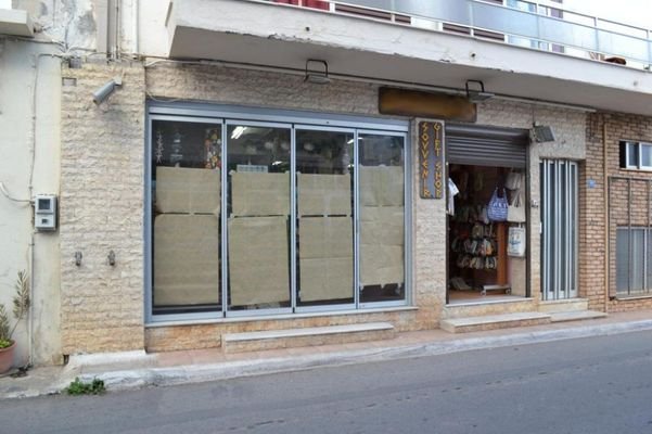 Kreta, Elounda: Erdgeschoss-Wohnung/-Geschäft im Zentrum zu verkaufen