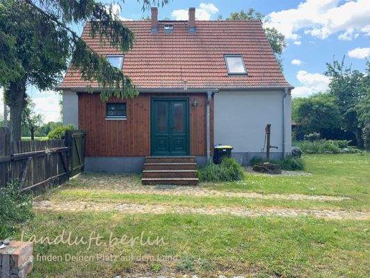 Hauseingang mit Windfang und Anblick von Norden.jp