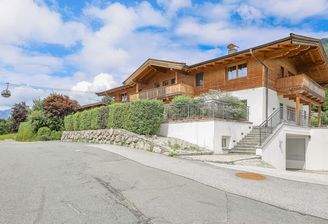 KITZIMMO-Exklusive Wohnung am Sonnberg Ski in / Ski out - Immobilien Kitzbühel.