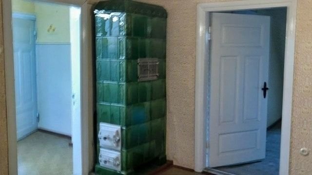 Wohnzimmer mit Kachelofen OG