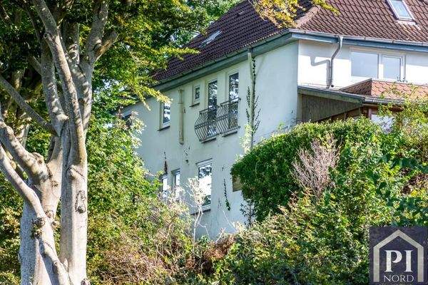 Blick von der Promenade auf das Haus