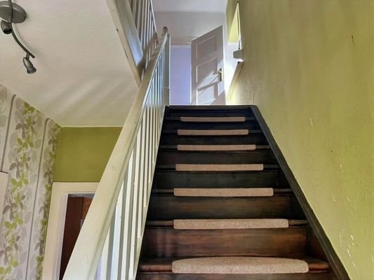 Treppe ins Obergeschoss