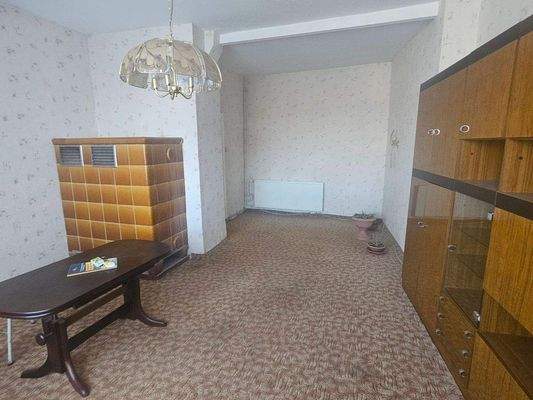 Wohnzimmer mit Kachelofen