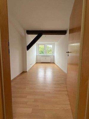 Kinderzimmer einer Wohnung im DG